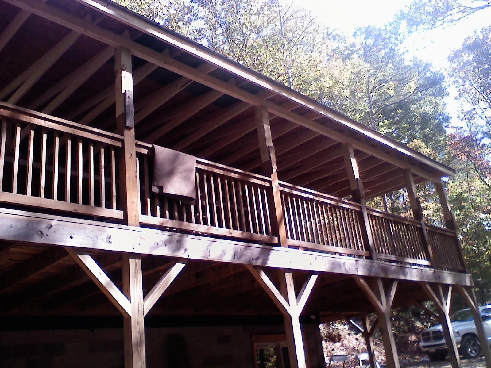 Timber framing under a new elevated porch and deck — Roof Leak Repair in Grapeview by Roofing Brothers
